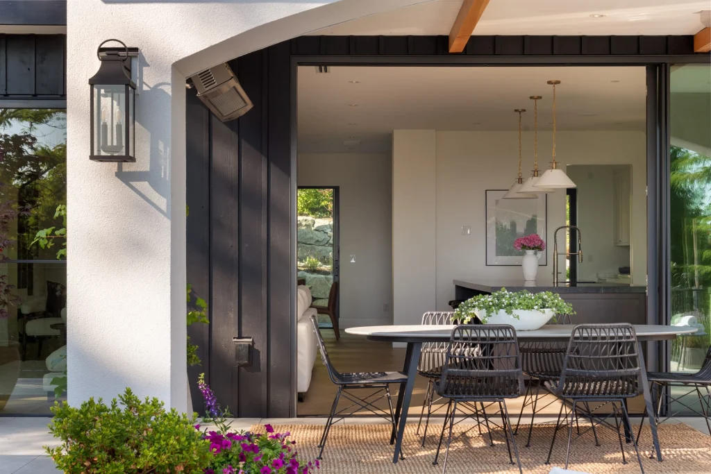 Covered outdoor dining looking into the Dickinson Residence